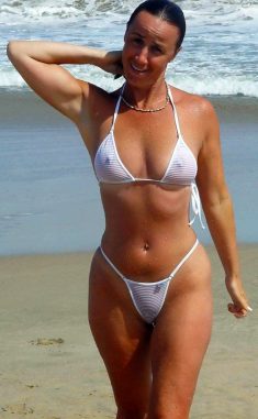 Amateur MILF in sexy bikini on the beach