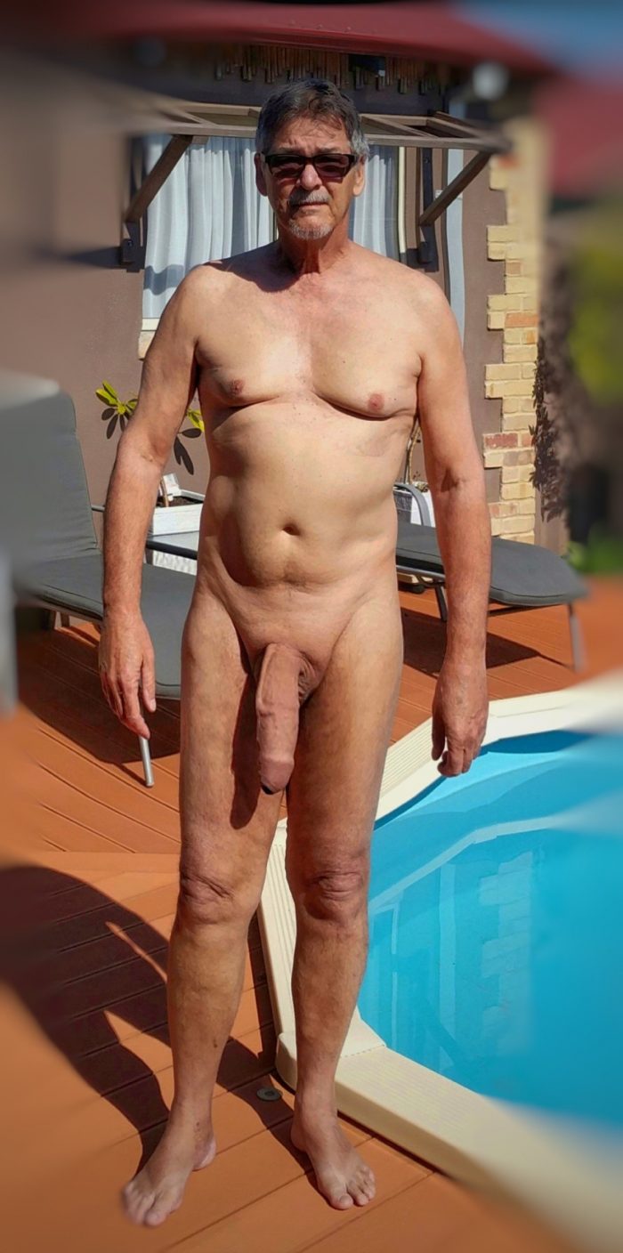 True nudist posing outdoors by the pool-02
