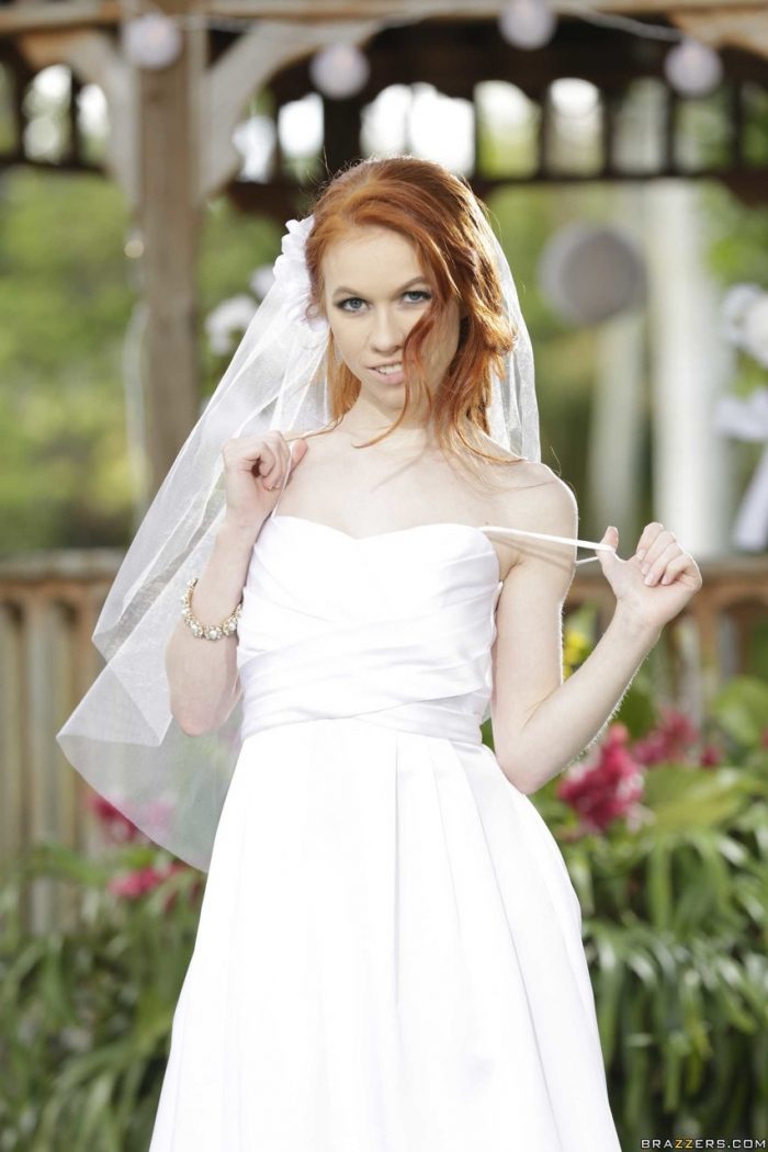 Redheaded bride Dolly Little strips off her hot wedding dress outdoors-03