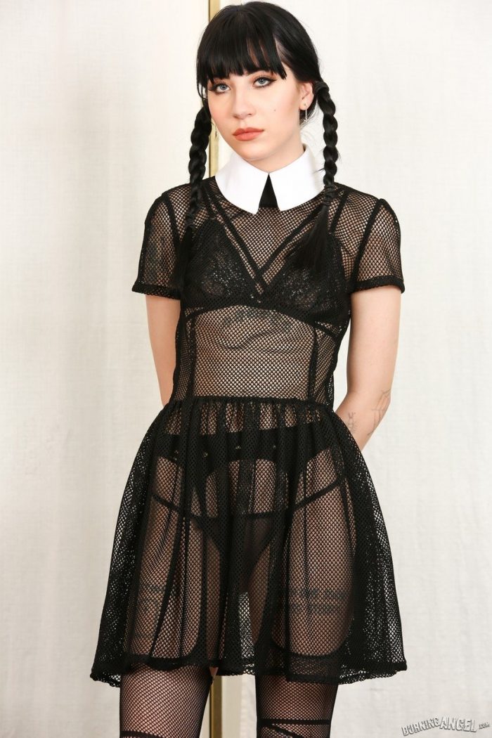 Tall thin brunette Charlotte Sartre as Wednesday Addams undresses sheer dress-03
