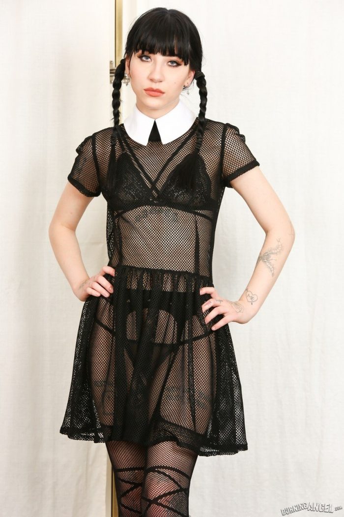 Tall thin brunette Charlotte Sartre as Wednesday Addams undresses sheer dress-04