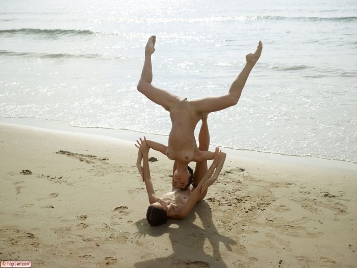 Flexible Girls Julietta and Magdalena posing naked on the beach-07
