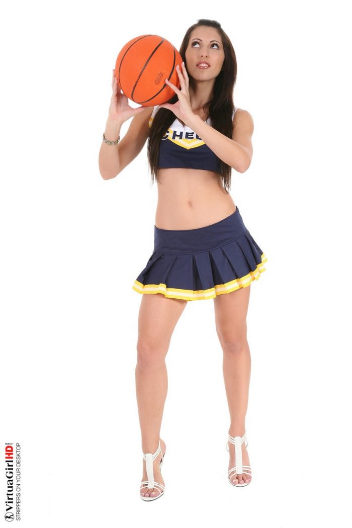 Brunette cheerleader Playful Ann frees tits and twat from uniform-02